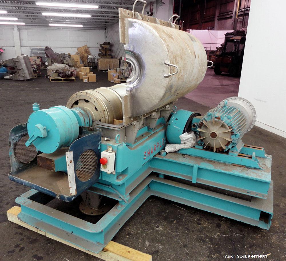 Used Sharples P-3000 Super-D-Canter Centrifuge. 316 Stainless steel construction (product contact areas), maximum bowl speed 3150 rpm, hogged- out cake discharge ports with replaceable wear liners, c...