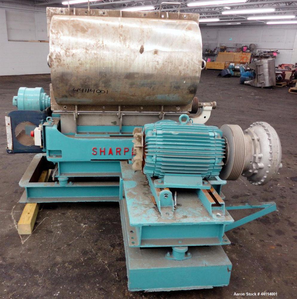 Used Sharples P-3000 Super-D-Canter Centrifuge. 316 Stainless steel construction (product contact areas), maximum bowl speed 3150 rpm, hogged- out cake discharge ports with replaceable wear liners, c...