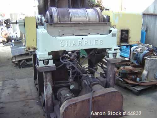 USED: Sharples p-3000 Super-D-Canter centrifuge, 316 S/S. Cylinder design, 3" single lead conveyor, side cake discharge ports, 1,2,3,4 slotted liquid dam plate, base, casing, feed tube & yoke, vibrat...