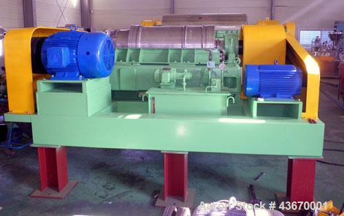 Used Sharples P-4600 Super-D-Canter Centrifuge, 316 stainless steel construction. Single lead conveyor with hardfacing, hogged-out cake port with replaceable wear liner, gearbox, base, casing.