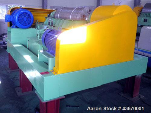Used Sharples P-4600 Super-D-Canter Centrifuge, 316 stainless steel construction. Single lead conveyor with hardfacing, hogged-out cake port with replaceable wear liner, gearbox, base, casing.