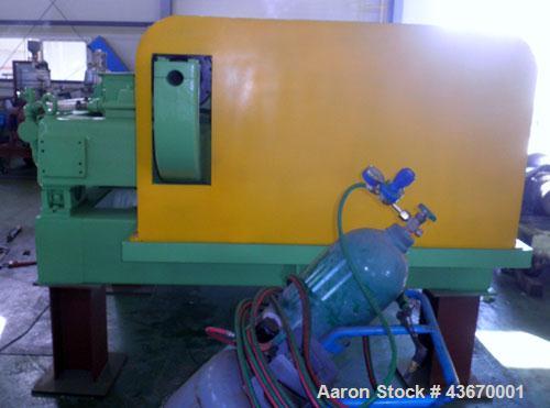 Used Sharples P-4600 Super-D-Canter Centrifuge, 316 stainless steel construction. Single lead conveyor with hardfacing, hogged-out cake port with replaceable wear liner, gearbox, base, casing.