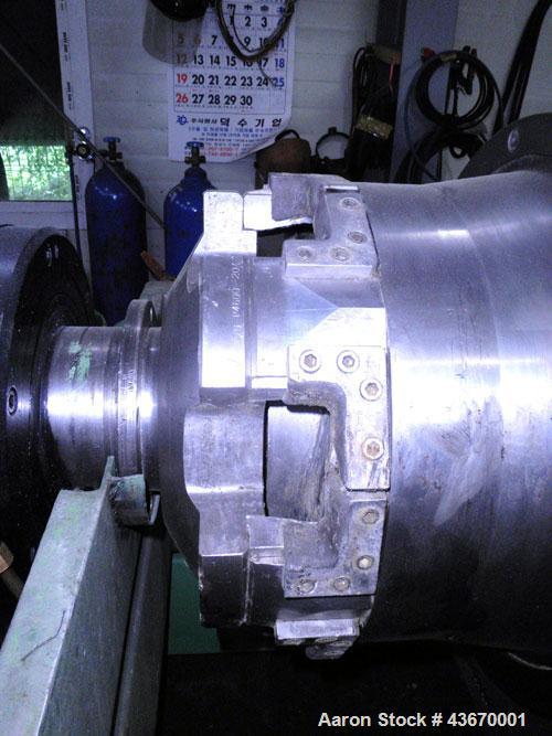 Used Sharples P-4600 Super-D-Canter Centrifuge, 316 stainless steel construction. Single lead conveyor with hardfacing, hogged-out cake port with replaceable wear liner, gearbox, base, casing.