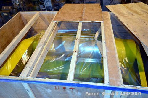 Used Sharples P-4600 Super-D-Canter Centrifuge, 316 stainless steel construction. Single lead conveyor with hardfacing, hogged-out cake port with replaceable wear liner, gearbox, base, casing.