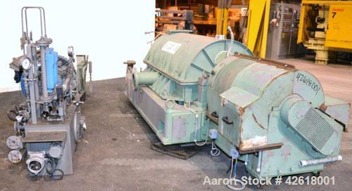 Used Sharples P-5000 Super-D-Canter Centrifuge. 2205 Stainless steel construction (product contact areas), maximum bowl speed 3000 rpm, 360 degree solids discharge ports with sintered tungsten carbid...