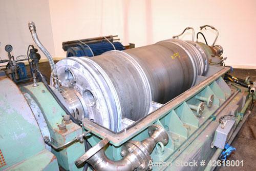 Used Sharples P-5000 Super-D-Canter Centrifuge. 2205 Stainless steel construction (product contact areas), maximum bowl speed 3000 rpm, 360 degree solids discharge ports with sintered tungsten carbid...