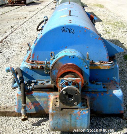 USED: Sharples PC-81000 Super-D-Canter Centrifuge, 304 stainless steel construction on product contact areas. Max bowl speed 2300 rpm, 8" single lead conveyor with tiles, 360 discharge with STC liner...
