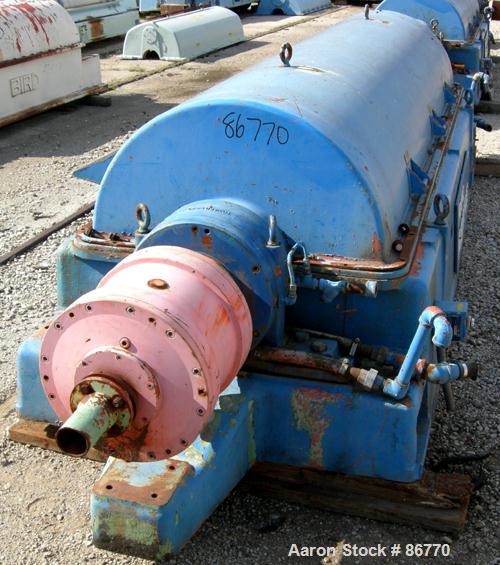 USED: Sharples PC-81000 Super-D-Canter centrifuge, 304 stainless steel construction on product contact areas. Max bowl speed 2300 rpm, 8" single lead conveyor with tiles, 360 discharge with STC liner...