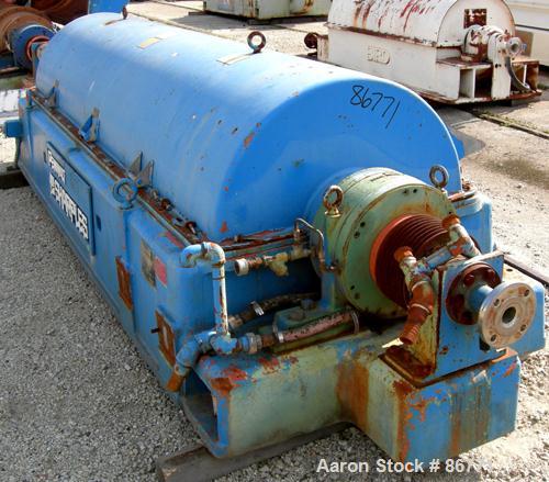 USED: Sharples PC-81000 Super-D-Canter centrifuge, 304 stainless steel construction on product contact areas. Max bowl speed 2300 rpm, 8" single lead conveyor with tiles, 360 discharge with STC liner...