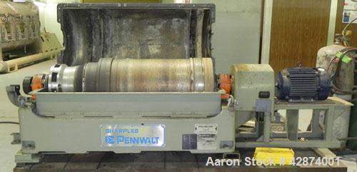 Used Sharples PM-35000 (Type RR-392) Super-D-Canter Centrifuge System. Driven by a 30 HP, 3/60/460 Volt, 1755 RPM motor. 10 HP backdrive motor. Includes a control panel with an Allen Bradley Panelvie...