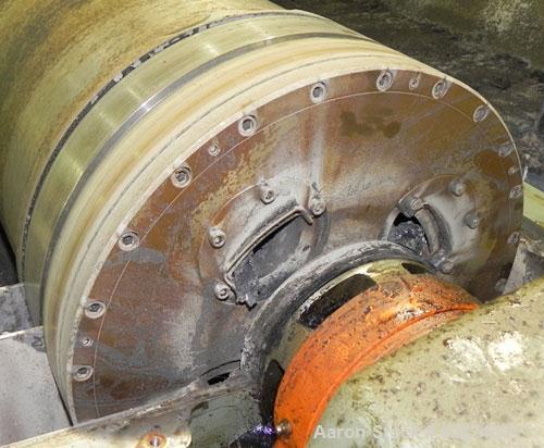Used Sharples PM-35000 (Type RR-392) Super-D-Canter Centrifuge System. Driven by a 30 HP, 3/60/460 Volt, 1755 RPM motor. 10 HP backdrive motor. Includes a control panel with an Allen Bradley Panelvie...