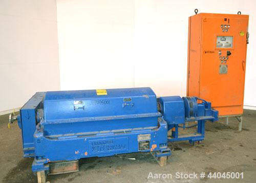 Used Sharples PM-35000 Super-D-Canter Centrifuge, 316 stainless steel construction on product contact areas.  Max bowl speed 3250 rpm, 5" single lead quasi-axial conveyor with sintered tungsten carbi...