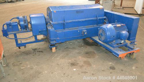 Used Sharples PM-35000 Super-D-Canter Centrifuge, 316 stainless steel construction on product contact areas.  Max bowl speed 3250 rpm, 5" single lead quasi-axial conveyor with sintered tungsten carbi...