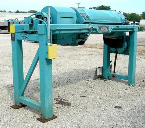 USED: Sharples PM38000 Super-D-Canter centrifuge, 316 stainless steel construction on product contact areas. Max bowl speed 4000 rpm, single lead conveyor, single row lined cake discharge, liquid pla...