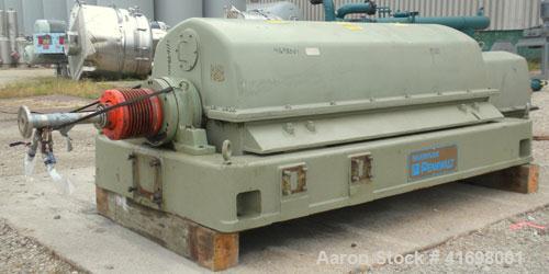 Used Sharples PM-55000 Super-D-Canter Centrifuge, 317 Stainless Steel Construction (Product Contact Areas). Maximum bowl speed 2850 RPM, 8 1/2" single lead conveyor with sintered tungsten carbide wea...