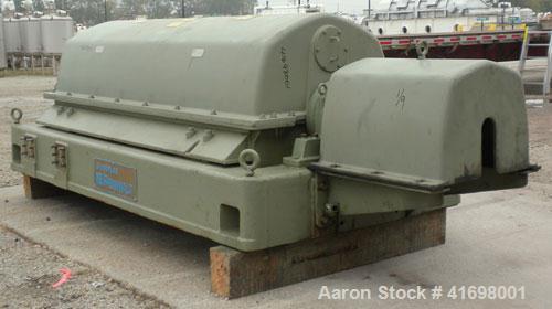 Used Sharples PM-55000 Super-D-Canter Centrifuge, 317 Stainless Steel Construction (Product Contact Areas). Maximum bowl speed 2850 RPM, 8 1/2" single lead conveyor with sintered tungsten carbide wea...