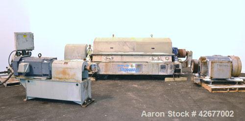 Used Sharples PM-75000 Super-D-Canter Centrifuge. 316/317 Stainless steel construction on product contact areas. Maximum bowl speed 2600 rpm, 360 degree solid discharge ports with STC liners, 10" sin...