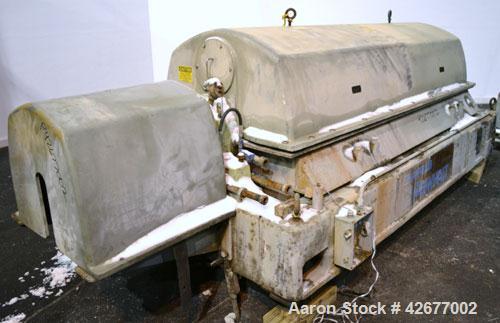 Used Sharples PM-75000 Super-D-Canter Centrifuge. 316/317 Stainless steel construction on product contact areas. Maximum bowl speed 2600 rpm, 360 degree solid discharge ports with STC liners, 10" sin...