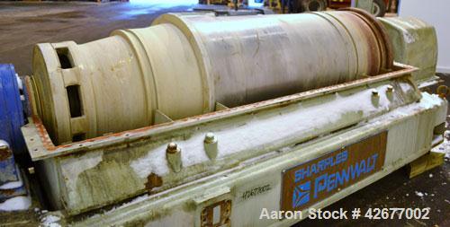 Used Sharples PM-75000 Super-D-Canter Centrifuge. 316/317 Stainless steel construction on product contact areas. Maximum bowl speed 2600 rpm, 360 degree solid discharge ports with STC liners, 10" sin...
