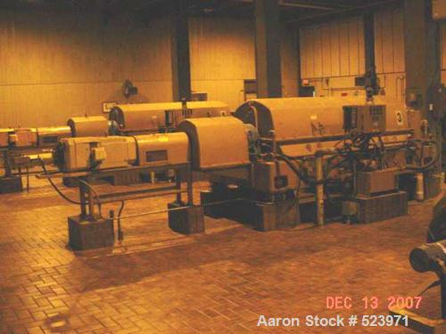 USED: Sharples PM-75000 Super-D-Canter centrifuge. 316/317 stainless steel construction on product contact areas, max bowl speed 2500 rpm, single lead conveyor with sintered tungsten carbide wear pro...