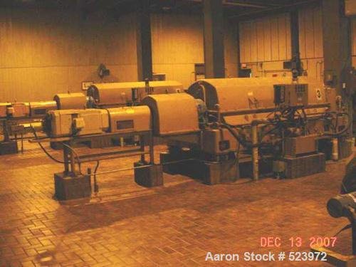 USED: Sharples PM-75000 Super-D-Canter centrifuge. 316/317 stainless steel construction on product contact areas, max bowl speed 2500 rpm, single lead conveyor with sintered tungsten carbide wear pro...