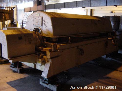 Used Sharples PM-85000 Super-D-Canter Centrifuge. 316 stainless steel construction on product contact areas. Max bowl speed 2345 rpm, sintered tungsten carbide lined beach section, 12" single lead tr...