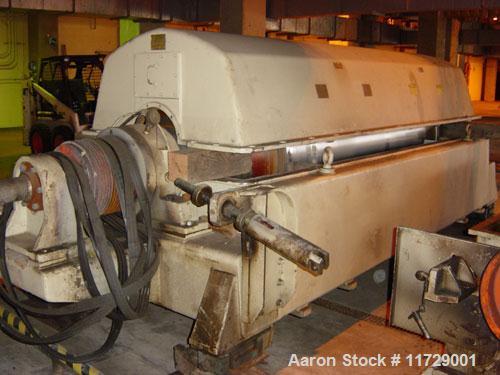 Used Sharples PM-85000 Super-D-Canter Centrifuge. 316 stainless steel construction on product contact areas. Max bowl speed 2345 rpm, sintered tungsten carbide lined beach section, 12" single lead tr...