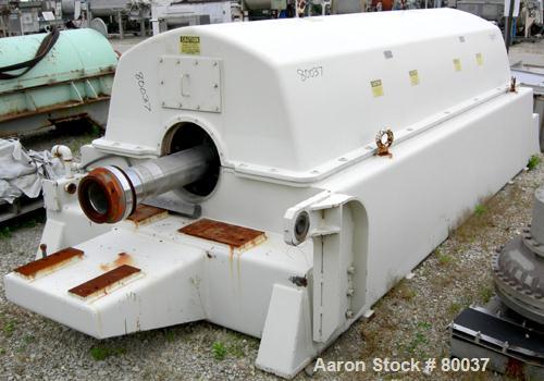 Used Sharples PM-85000 Super-D-Canter Centrifuge, 316 Stainless Steel Construction on Product Contact Areas. Max bowl speed 2345 RPM, sintered tungsten carbide lined beach section, 12" single lead tr...