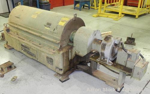 Used Sharples PM30000 Decanter Centrifuge, Type PR264/10 484720, 316 Stainless Steel. Driven by a 30 HP, 3/60/575 Volt, 1755 RPM motor. Includes drive & a control panel.