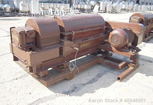 Used Sharples PM-35000 Super-D-Canter Centrifuge, 316 stainless steel construction  (product contact areas ), maximum bowl speed 3150 rpm, 5 1/2" quasi-axial single lead conveyor with sintered tungst...