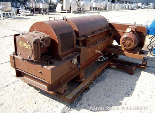 Used Sharples PM-35000 Super-D-Canter Centrifuge, 316 stainless steel construction  (product contact areas ),  maximum bowl speed 3150 rpm, 5 1/2" quasi-axial single lead conveyor with sintered tungs...