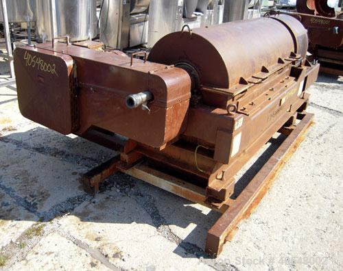 Used Sharples PM-35000 Super-D-Canter Centrifuge, 316 stainless steel construction  (product contact areas ),  maximum bowl speed 3150 rpm, 5 1/2" quasi-axial single lead conveyor with sintered tungs...