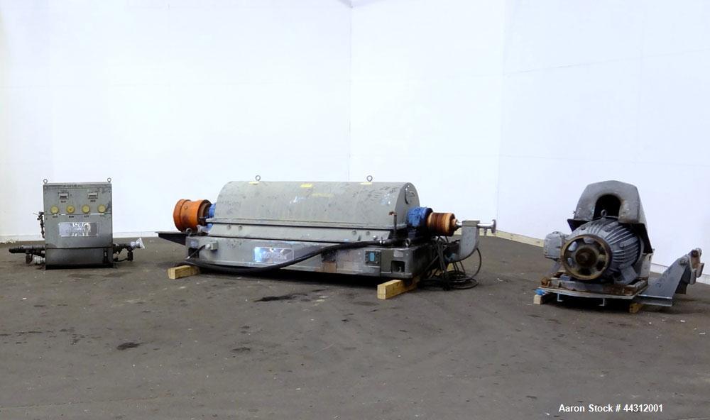 Used Sharples PM-55000 Super-D-Canter Centrifuge. 317 Stainless steel construction (product contact areas), 8” single lead quasi-axial conveyor with STC wear protection tiles, 360 degree solids disch...