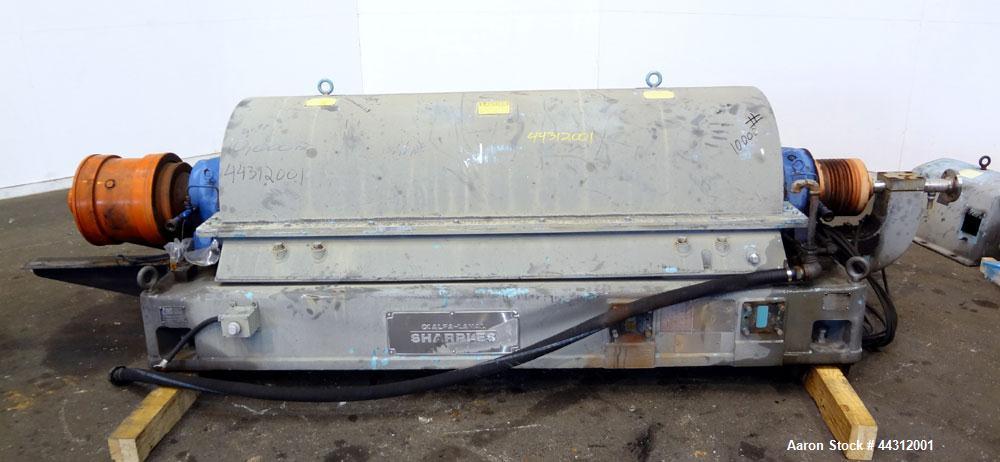 Used Sharples PM-55000 Super-D-Canter Centrifuge. 317 Stainless steel construction (product contact areas), 8” single lead quasi-axial conveyor with STC wear protection tiles, 360 degree solids disch...