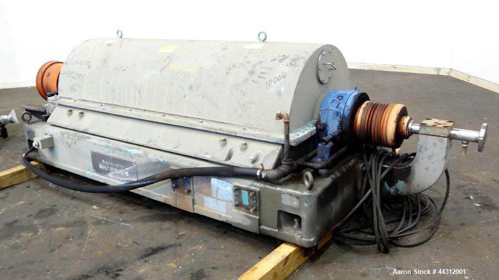Used Sharples PM-55000 Super-D-Canter Centrifuge. 317 Stainless steel construction (product contact areas), 8” single lead quasi-axial conveyor with STC wear protection tiles, 360 degree solids disch...