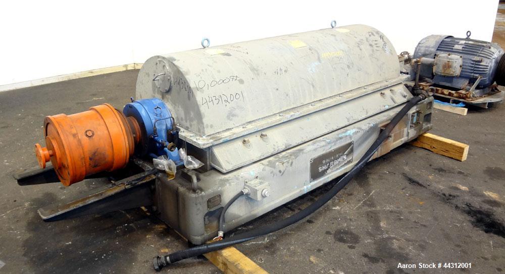 Used Sharples PM-55000 Super-D-Canter Centrifuge. 317 Stainless steel construction (product contact areas), 8” single lead quasi-axial conveyor with STC wear protection tiles, 360 degree solids disch...