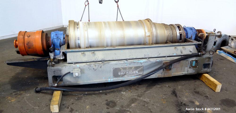 Used Sharples PM-55000 Super-D-Canter Centrifuge. 317 Stainless steel construction (product contact areas), 8” single lead quasi-axial conveyor with STC wear protection tiles, 360 degree solids disch...