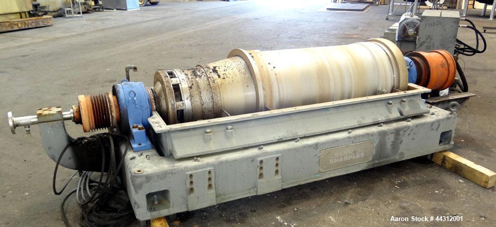 Used Sharples PM-55000 Super-D-Canter Centrifuge. 317 Stainless steel construction (product contact areas), 8” single lead quasi-axial conveyor with STC wear protection tiles, 360 degree solids disch...