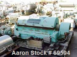 USED: Sharples P3400 Super-D-Canter in carbon steel constructionincluding the rotating assm and casing, with 4-1/4" pitch conveyorwith welded hardsurfacing, hogged out cake ports with replaceableline...