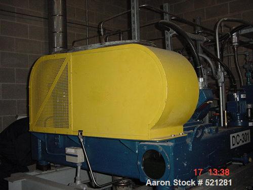 USED: Siebtechnik TS-360 solid bowl decanter centrifuge, stainlesssteel construction on product contact areas. Approx 40 hp main drivemotor, lubrication system, base, casing, feed pipe, safety guards.