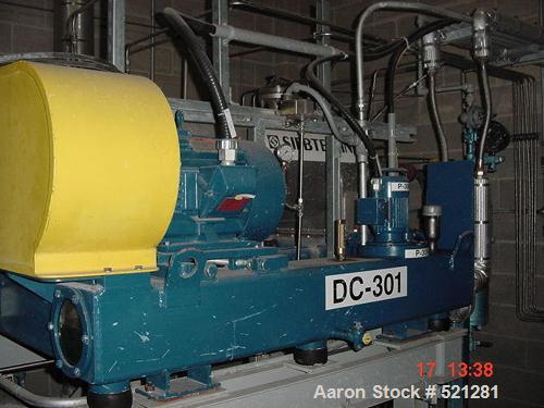USED: Siebtechnik TS-360 solid bowl decanter centrifuge, stainlesssteel construction on product contact areas. Approx 40 hp main drivemotor, lubrication system, base, casing, feed pipe, safety guards.