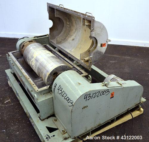 Used Tomoe TSM-010 Super-D-Canter Centrifuge. 316 Stainless steel construction (product contact areas), maximum bowl speed 3900 rpm, cake discharge ports, 3" single lead conveyor with STC tiles, 360 ...