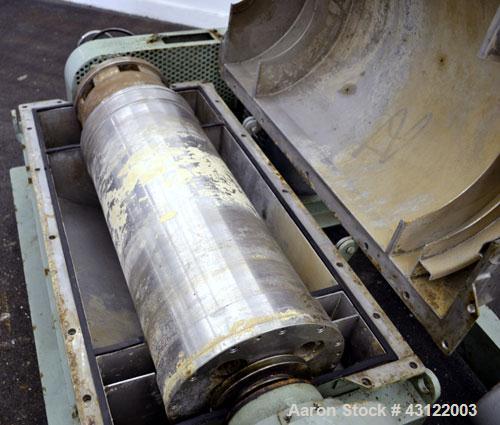 Used Tomoe TSM-010 Super-D-Canter Centrifuge. 316 Stainless steel construction (product contact areas), maximum bowl speed 3900 rpm, cake discharge ports, 3" single lead conveyor with STC tiles, 360 ...