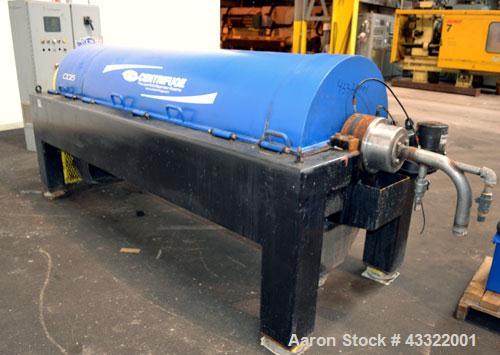 Used US Centrifuge CQ5 Solid Bowl Decanter Centrifuge, Model CQ5000. 2205 Stainless steel construction (product contact areas). Maximum bowl speed 2860 rpm, 6” single lead conveyor with welded hard f...