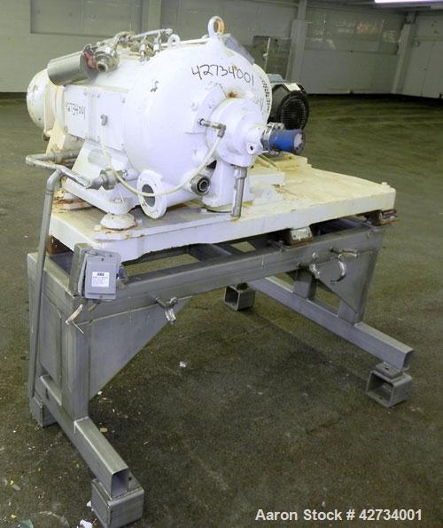 Used Westfalia CA-220 Solid Bowl Decanter Centrifuge. 316 Stainless steel construction (product contact areas), maximum bowl speed 4000 rpm, single lead conveyor with welded hardfacing, casing, sub-b...