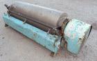 Used Alfa Laval decanter, type NX 418B-31G. 316 stainless steel construction on product contact parts. Approximate maximum bowl speed 4000. Single lead conveyor. Complete with gearbox.