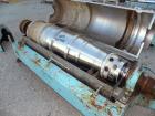 Used Alfa Laval decanter, type NX 418B-31G. 316 stainless steel construction on product contact parts. Approximate maximum bowl speed 4000. Single lead conveyor. Complete with gearbox.