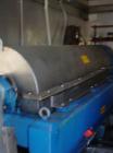 USED: Alfa Laval NX-5000 solid bowl decanter centrifuge, stainlesssteel construction on product contact areas. Max bowl speed 2700 rpm,base, casing, gearbox, pumps, mixers, hydraulic system. Complete...