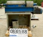 Used Alfa Laval NX-309S-31G Solid Bowl Decanter Centrifuge. Max bowl speed 5600 RPM, stainless steel construction on product contact areas, single lead conveyor, single row of cake discharge ports, b...
