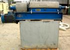 Used Alfa Laval NX-309S-31G Solid Bowl Decanter Centrifuge. Max bowl speed 5600 RPM, stainless steel construction on product contact areas, single lead conveyor, single row of cake discharge ports, b...